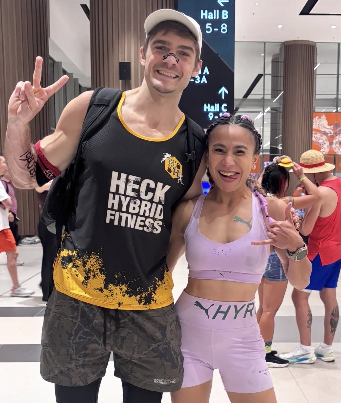 Dina with her doubles partner at a Hyrox race